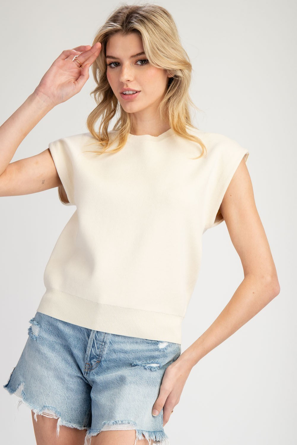 Cream Sleeveless Sweater Top